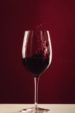 splash of wine in wineglass clipart