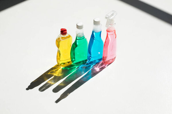 plastic bottles of cleaning fluids 