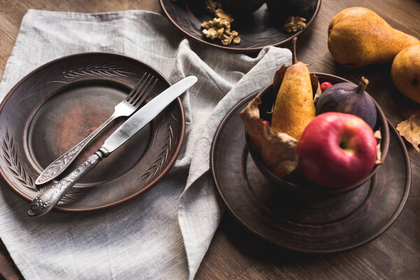 fruits and plates on table