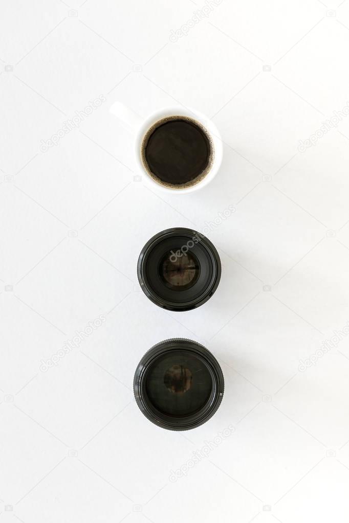 lenses and coffee mug