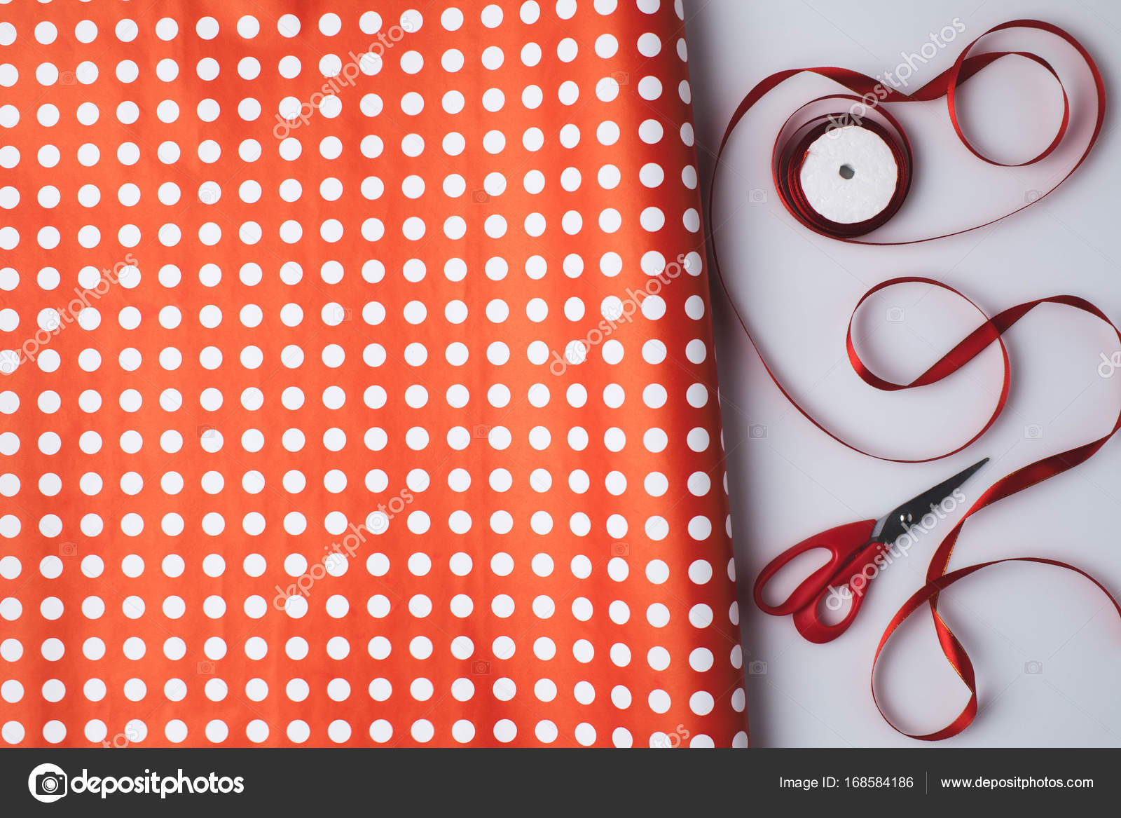 Wrapping paper and ribbon — Stock Photo © AntonMatyukha 168584186