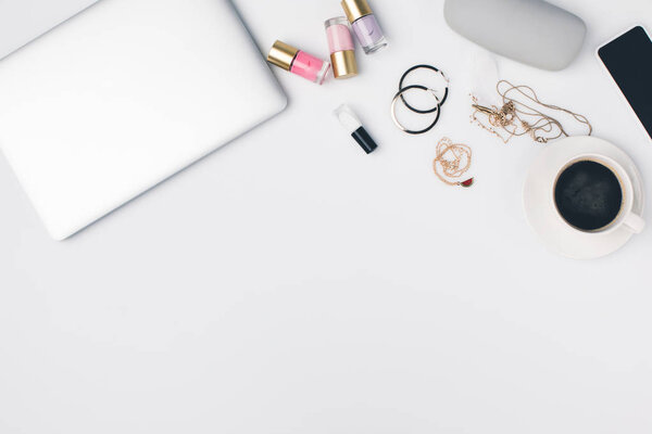 modern girly workplace with laptop