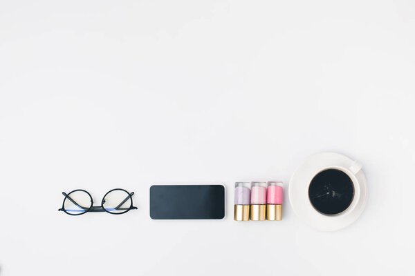 coffee, nail polishes and smartphone