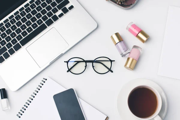 Modern girly workplace with laptop — Stock Photo, Image