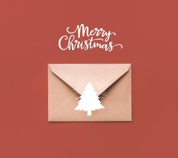 Christmas kraft envelope with greeting — Stock Photo, Image