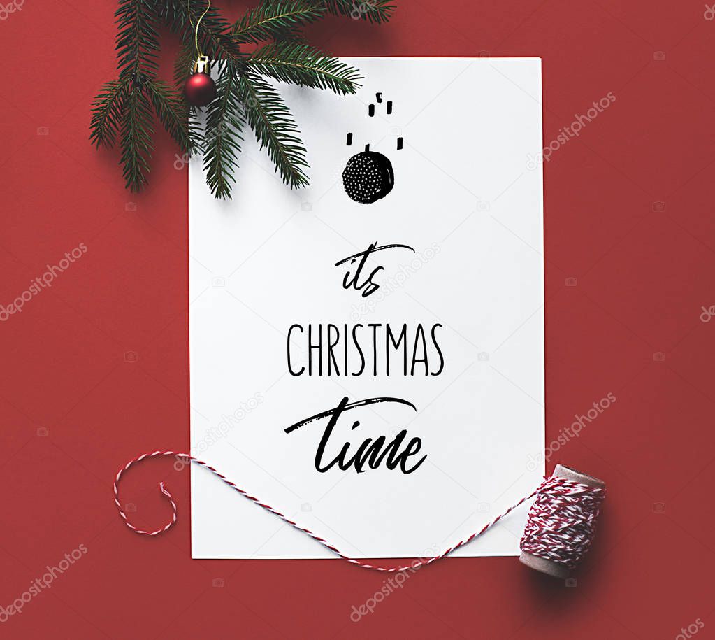 Christmas card with fir tree branch 
