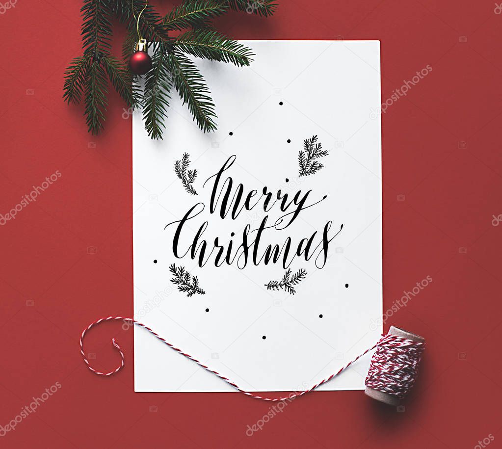 Christmas card with fir tree branch 