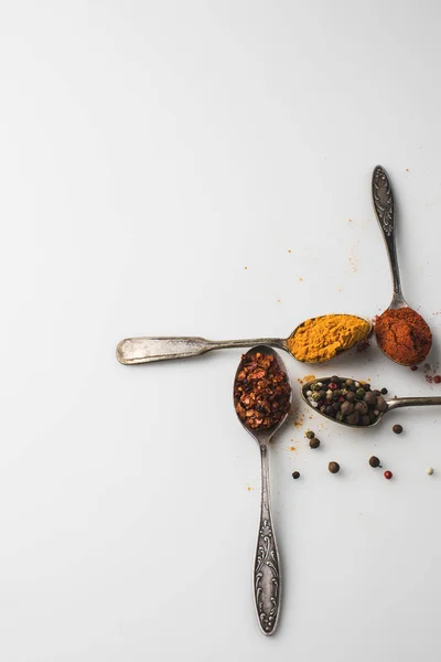 Spoons with various spices — Stock Photo, Image