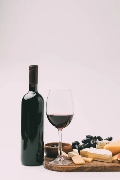 Wine and various snacks — Stock Photo, Image