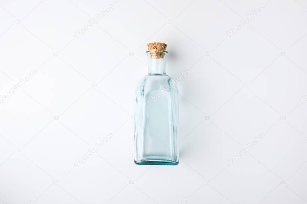 transparent glass bottle with cork
