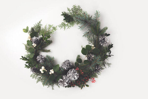 christmas wreath with fir branches and mistletoe