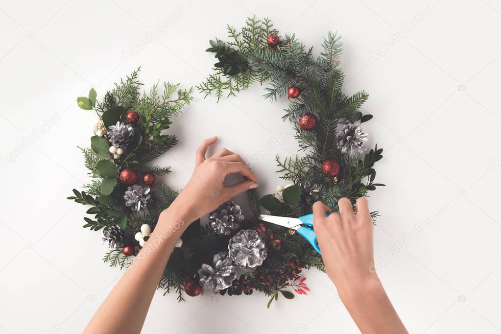 making christmas wreath from fir branches