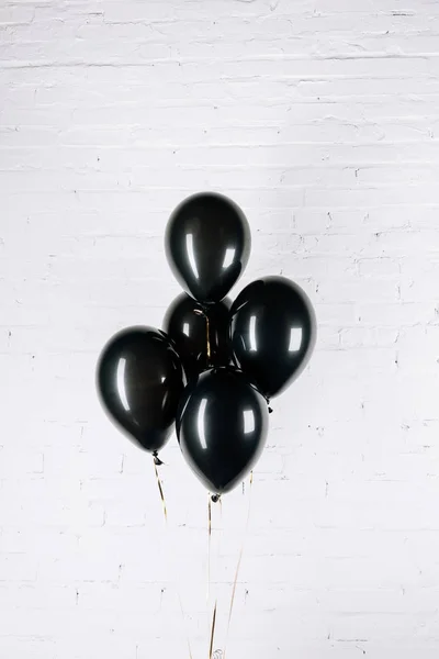 Czarny błyszczący balony — Zdjęcie stockowe