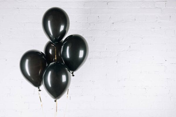 shiny black balloons