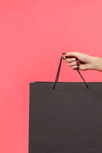 Person holding shopping bag — Stock Photo, Image