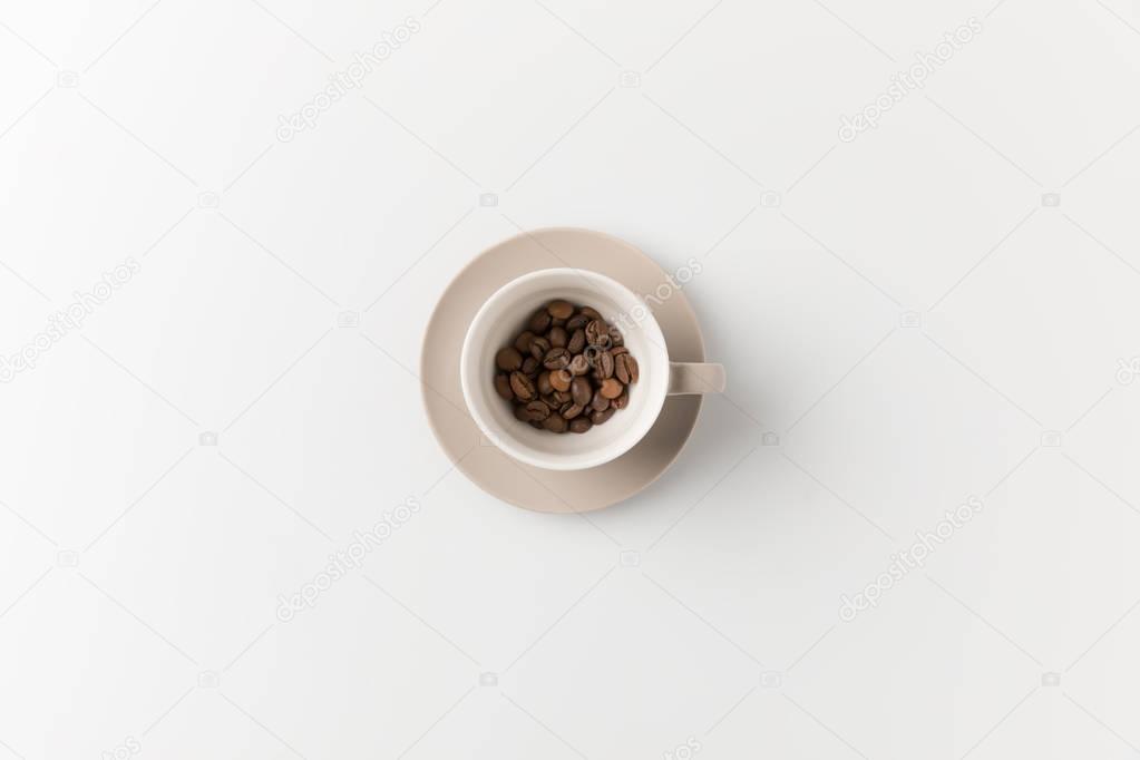 cup with coffee beans