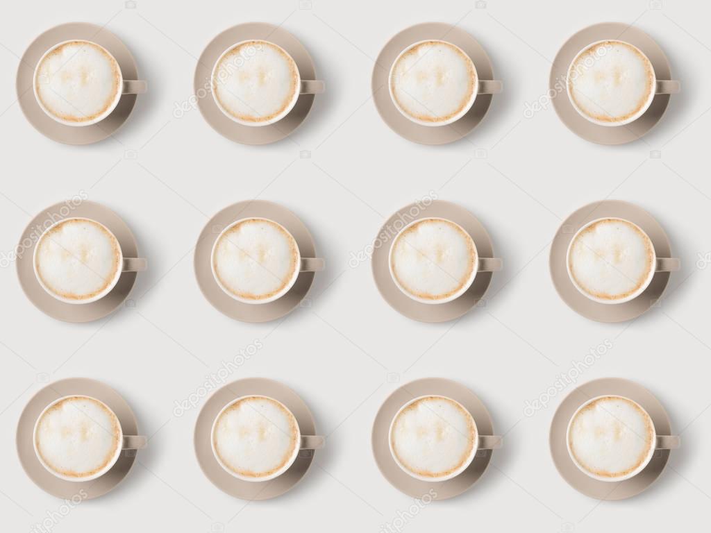 pattern of cups with latte