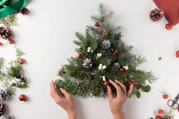 Hand making christmas tree — Stock Photo, Image