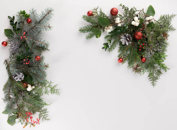 fir branches with christmas balls and cones