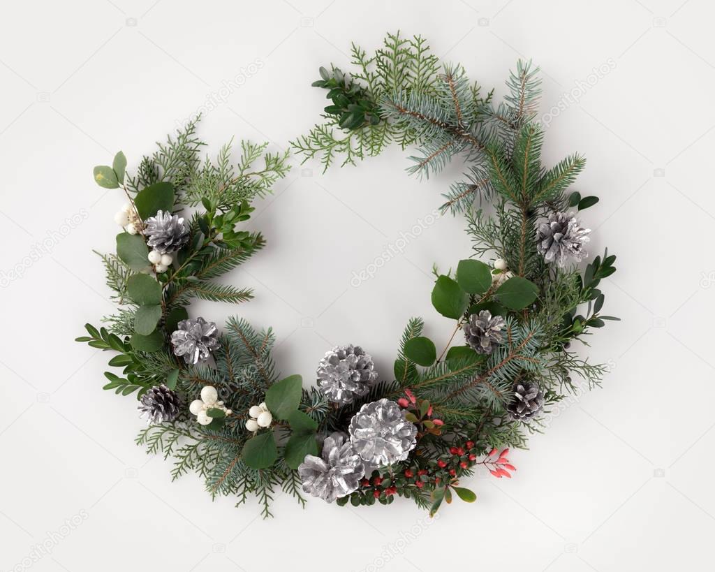 christmas wreath with fir branches and mistletoe