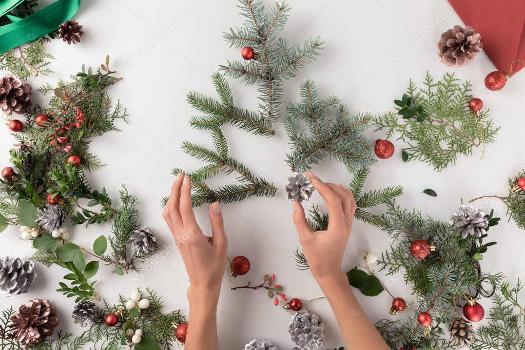 hand making christmas tree 