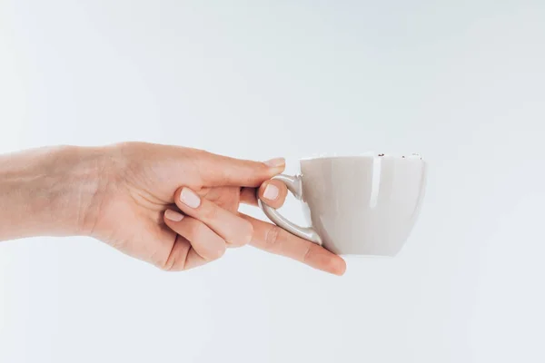 Mão segurando xícara de café — Fotografia de Stock