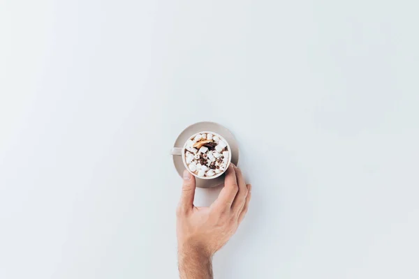 Hand with cup of cacao — Stock Photo, Image