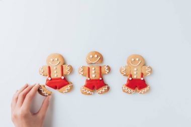 hand with Gingerbread men clipart