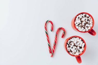 cacao with marshmallows and candy canes clipart