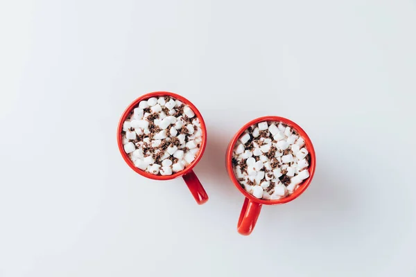 Red cups with hot cacao — Stock Photo, Image