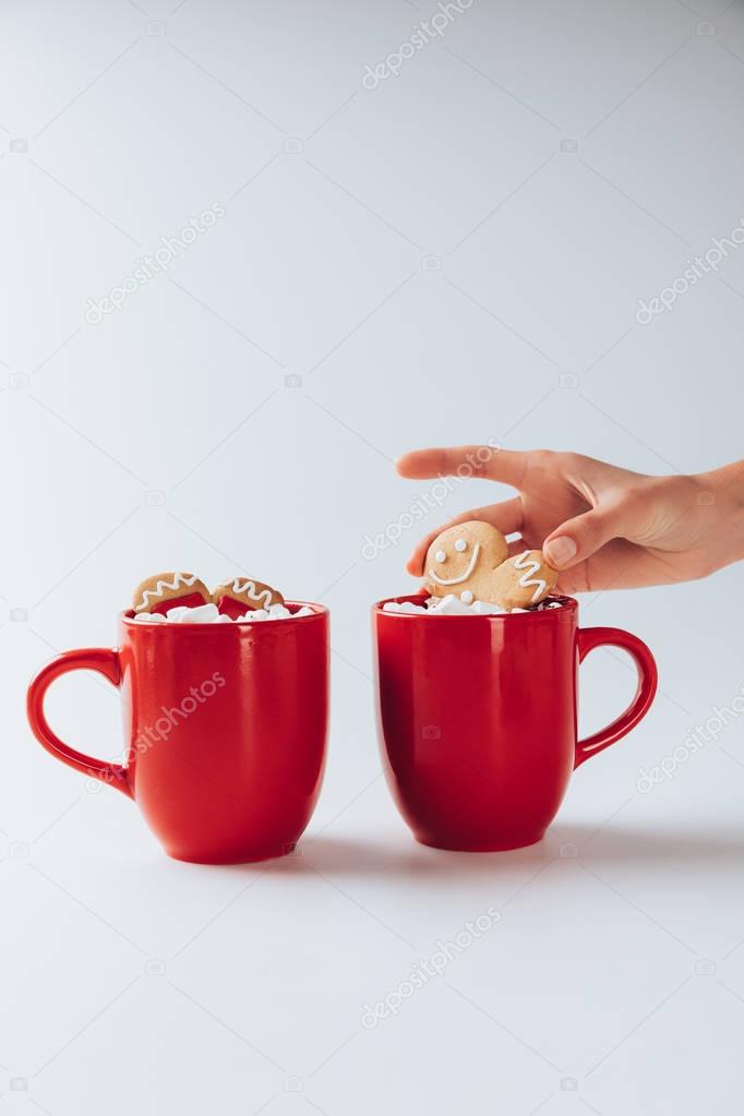 hot cacao with marshmallows and gingerbread men