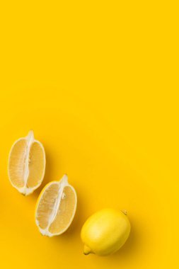 Two halves of lemon and single lemon clipart