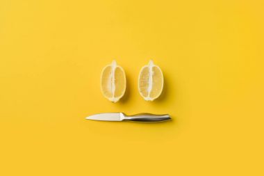 Knife and lemons halves clipart