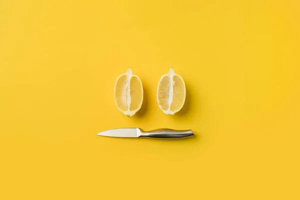 Nůž a citrony půlky — Stock fotografie