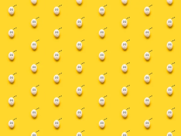 Painted chicken eggs with sleeping emoji — Stock Photo, Image