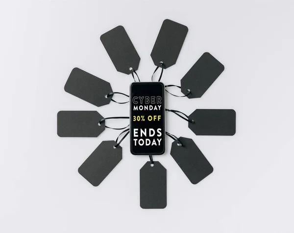 Smartphone en lege tags — Stockfoto