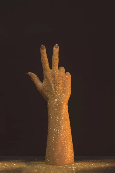 Восковая рука показывает три пальца — стоковое фото