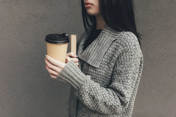 woman with book and coffee