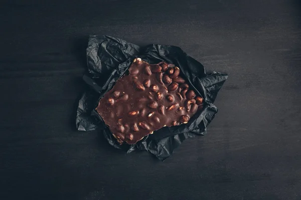 Chocolate on gray wrapper — Stock Photo, Image