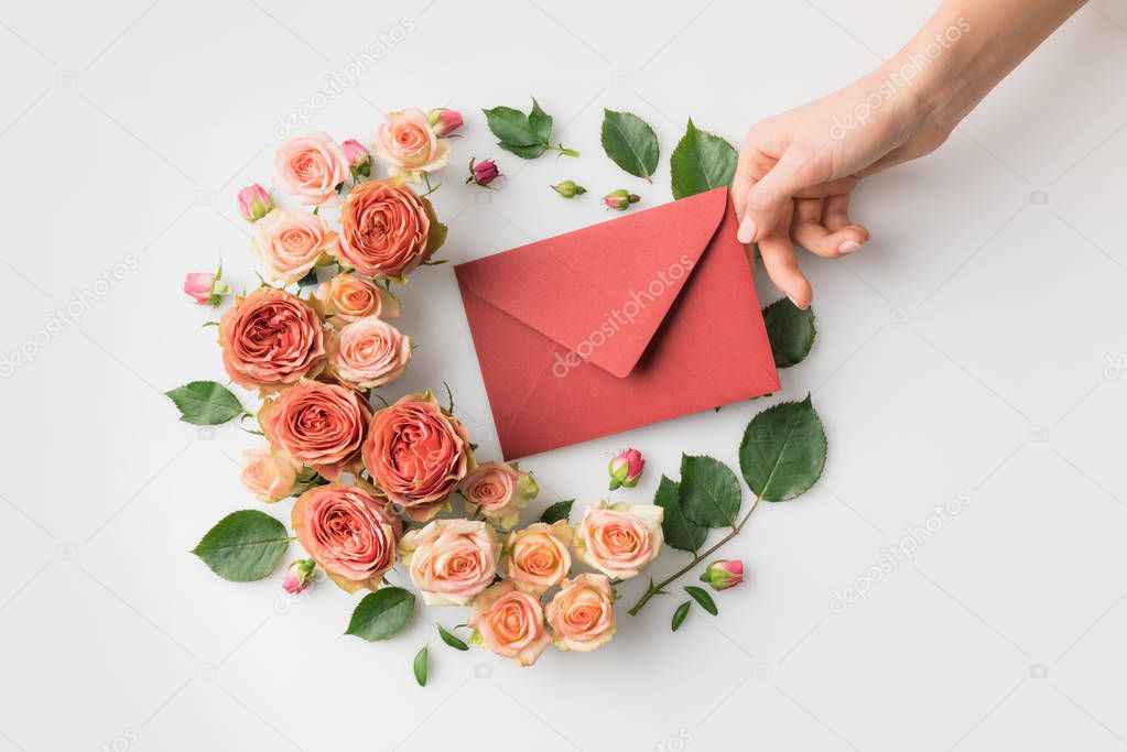 envelope surrounded by flowers