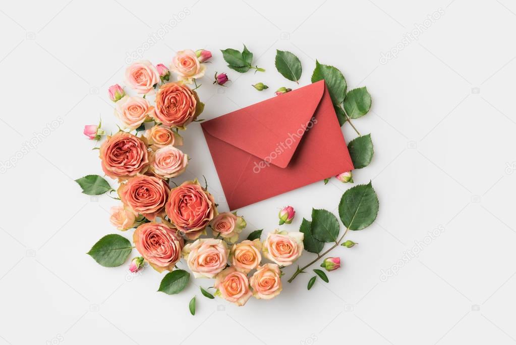 envelope surrounded by flowers