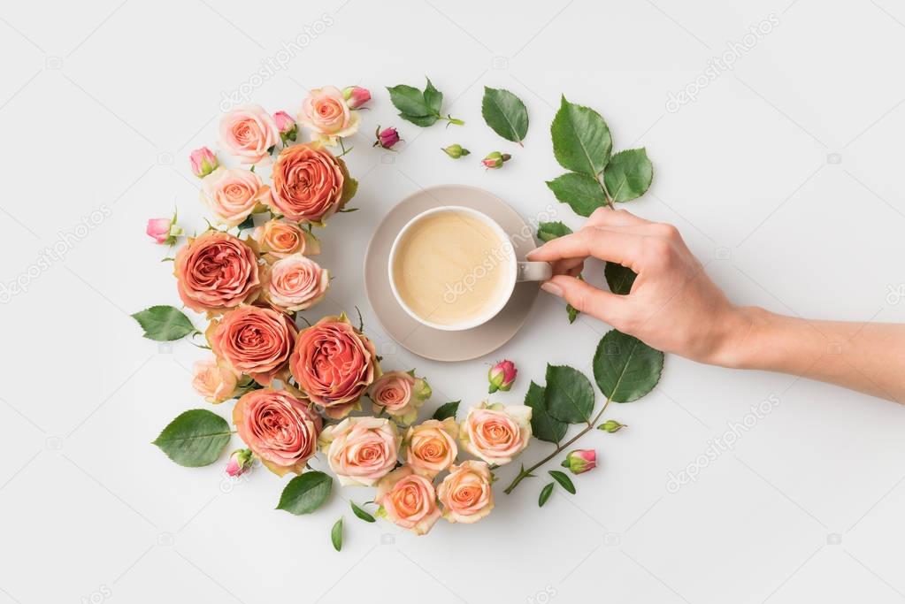flower wreath with coffee cup