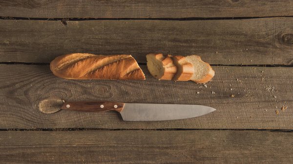sliced baguette and knife 