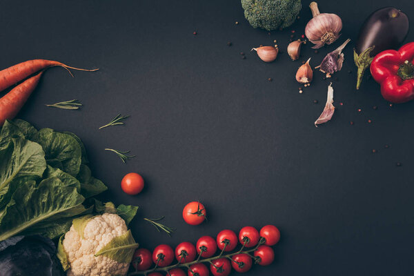 top view of raw vegetables on gray table