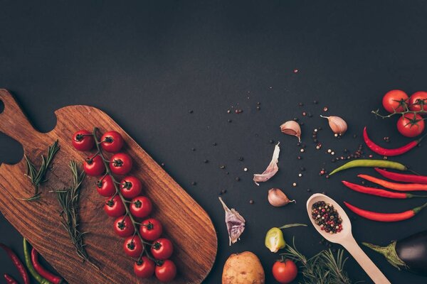 top view of vegetables and spices on gray table