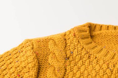 knitted yellow sweater with pattern clipart