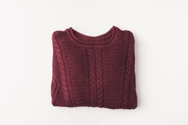 Вязаный бордовый свитер — стоковое фото
