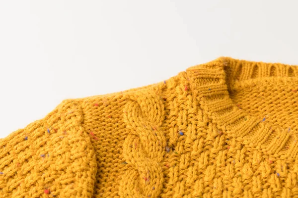 Knitted yellow sweater with pattern — Stock Photo, Image