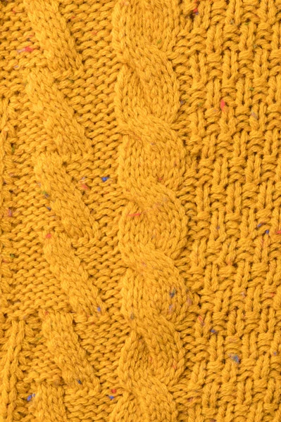 Texture of yellow sweater with pattern — Stock Photo, Image