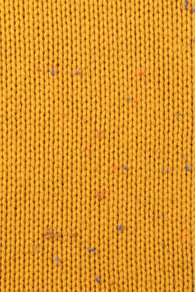 Textur des gestrickten gelben Pullovers — Stockfoto